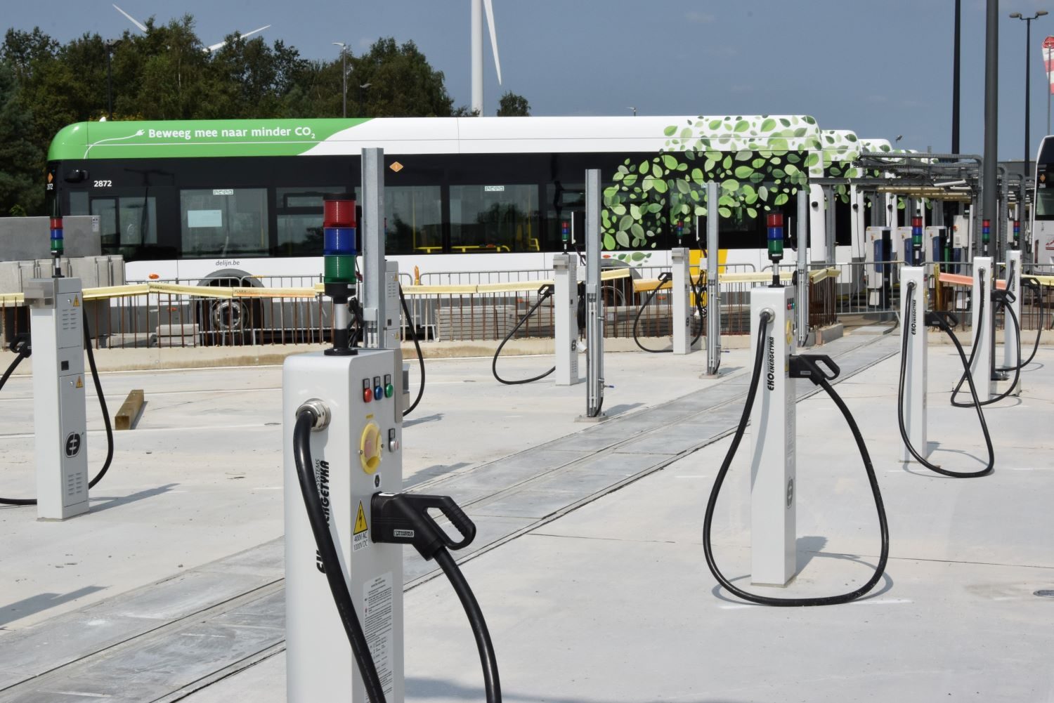 Ekoenergetyka charging satellites with CCS2 plugs at a De Lijn depot